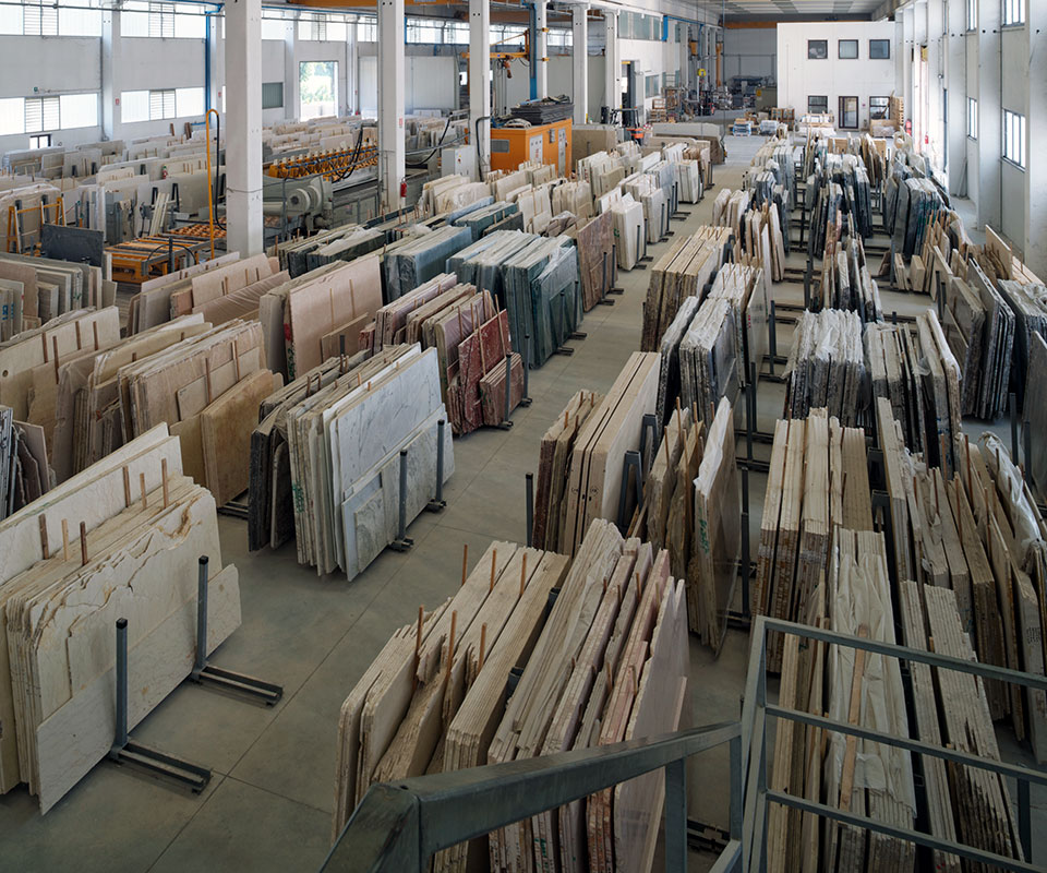 Processing of marble, onyx, travertine, agglomerates, and semi-precious stones.