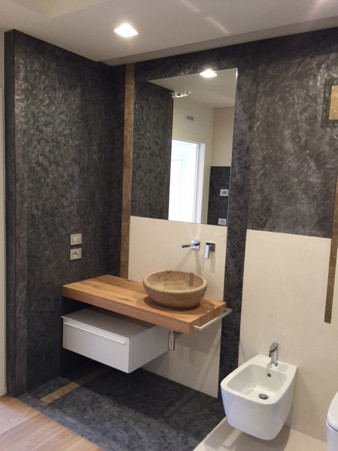 Bathrooms: marble, granite and natural stone coverings