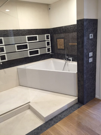 Bathrooms: marble, granite and natural stone coverings